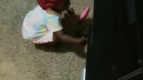 Baby Tries Lifting Weights