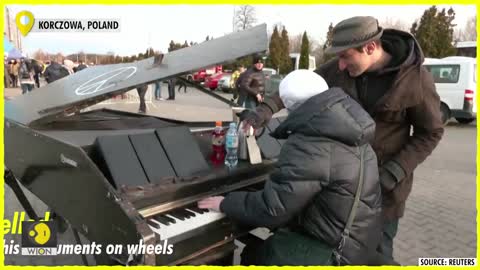 Watch_ ‘Piano Man’ plays for Ukrainians arriving at Polish border _ Russian inva
