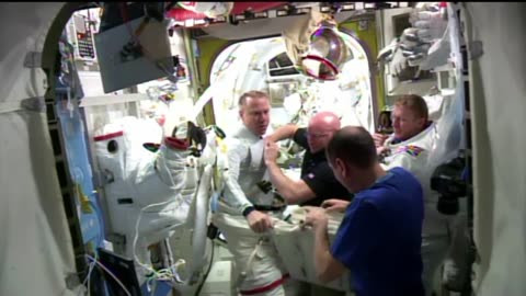 Space Station Crew Restores Full Power to the Complex During a Shortened Spacewalk