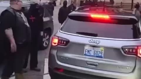 BLM Protester Cocks And Brandishes Weapon At Driver In Grand Rapids, Michigan