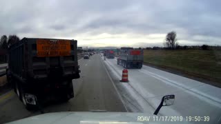 Truck Slides into Stationary Traffic