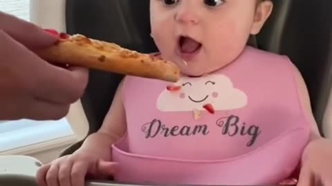 Cute baby trying to eat in a cute way❤️❤️😍