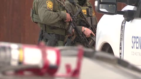 Arizona - Illegals Rush through a Breach in the Border Wall - Smuggler Shrugs and Saluted the Camera