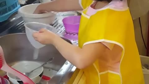 Helpful Little Girl Loves To Assist With The Dishes