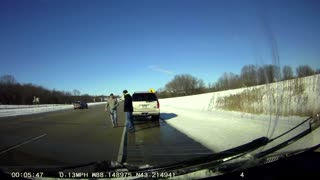Trailer Rolls Over After Sliding on Icy Highway
