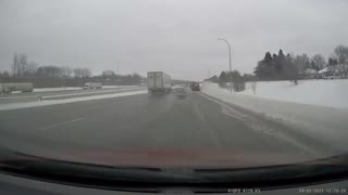 Car Spins out on Slick Roads and Dodges all Traffic