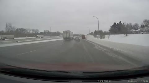 Car Spins out on Slick Roads and Dodges all Traffic