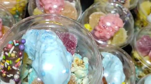 Rainbow cup of sweets and candies