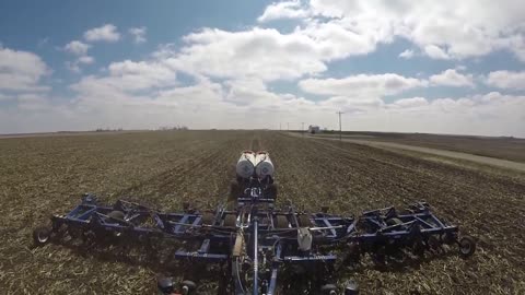 John Deere 9430 pulling 52.5' anhydrous bar