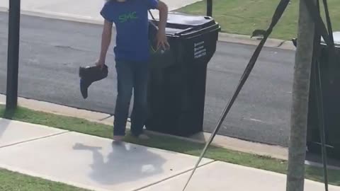 Brother throws a boot at sister
