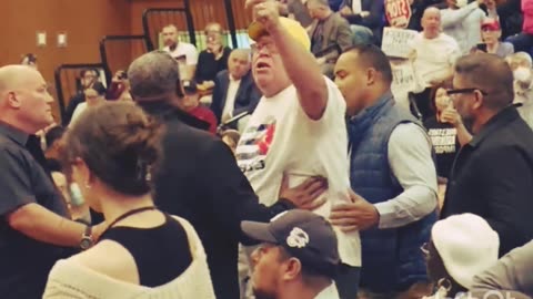 American citizens before migrants Heckler dirspurs AOC townhall meeting crowed