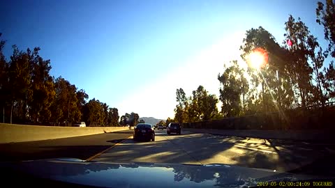 Black Lexus squats in passing lane