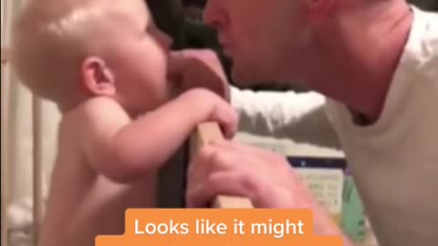Baby Theo, who is just 11-months-old, was playing peekaboo with his dad, when