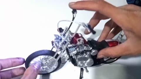 using a plastic pipe to create a small Harley Davison machine chopper