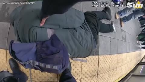 Police officers rescue man stuck on tracks seconds before train arrives