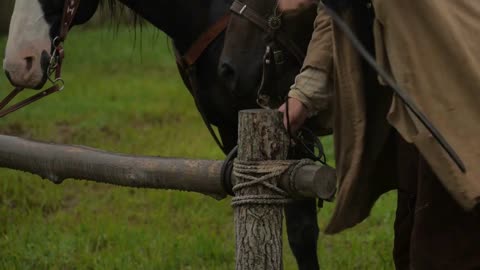 Man Ties Horse To Hitching Post, Western Era