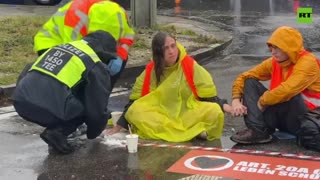 Activists glue themselves to roads in Germany, demanding climate action