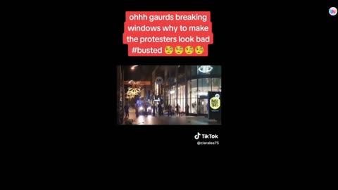 Dublin Riots-Gardai breaking windows at the Ilac Centre 23-11-23