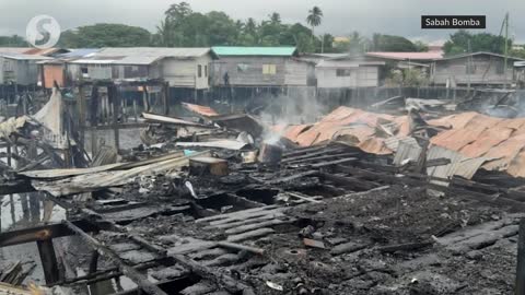 Man looking for family during Sabah water village fire found dead