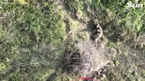 Ukrainian drones drop bombs on Russian frontline soldiers
