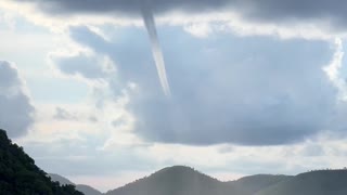 Waterspout Spotted Near a Boat