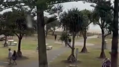 been spotted towing a boat with a mobility scooter through the main street of Coolangatta