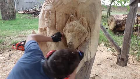 AMAZING CHAINSAW wood carving, Native American with wolves