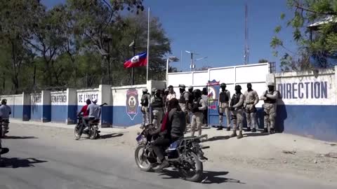Haiti police block roads, burn tires in protest