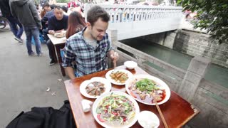 Eating Pig Brain and Yak at a Fly Restaurant in Sichuan, China