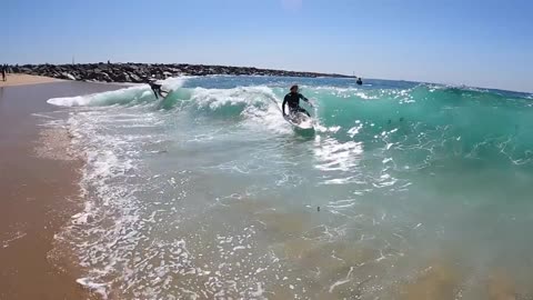 Surfing and Skimboarding WEDGE on massive HIGH TIDE