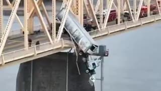 030124 Dramatic Rescue Efforts can be seen as Semi-Truck Dangles Off the Bridge