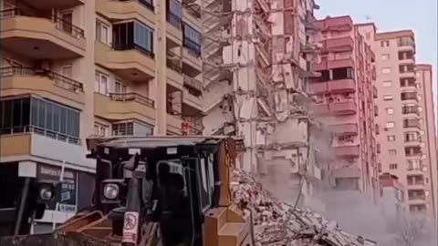 Shovel brings down a tall building alone!!!