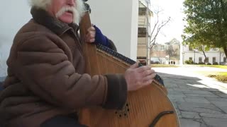 An old Cossack man sings a heartful Ukranian song in Kyiv, Ukraina