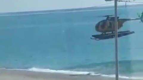 Italy Hunts Down Masklesss Beach-goers with Helicopters