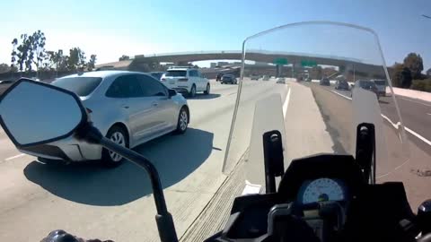 Dumb female driver, motorcycle loud horn, evasive maneuver 2022