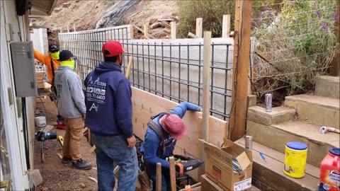 Build & Pour Concrete Retaining Wall After Hillside Slide