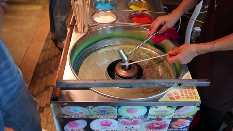 Cotton candy made of colorful pieces/ cotton candy art/streetfoods