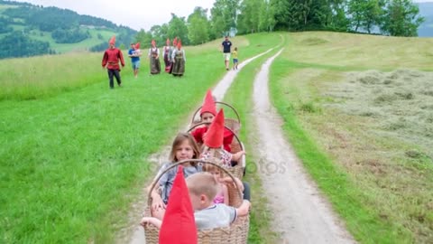 Children Wearing Red Dwarf Hats Basket