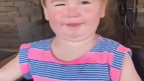 Adorable baby's reaction to eating lemon