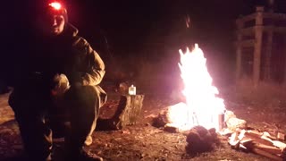 Test footage. Positioning the camera to capture the campfire.