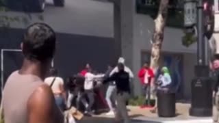 Mall brawl - Shocking moment mass-fight erupts at upscale LA shopping center The Grove