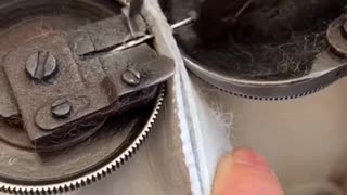 Commercial sawing machine at work in slow motion