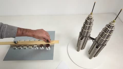 Railgun VS Petronas Twin Towers out of Magnetic Balls _ Magnetic Games