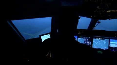 skilled pilot flying cockpit