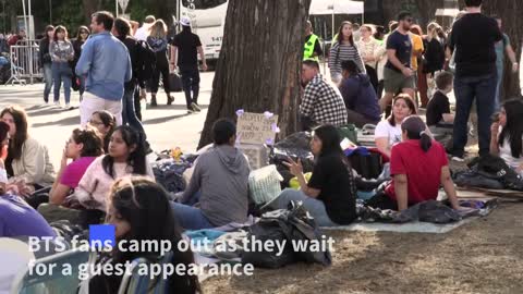 BTS fans camp out to see superstar Jin perform with Coldplay | AFP