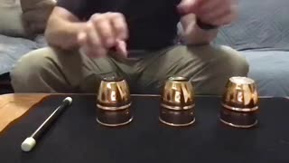 Easy version of Ancient Cups and Balls trick