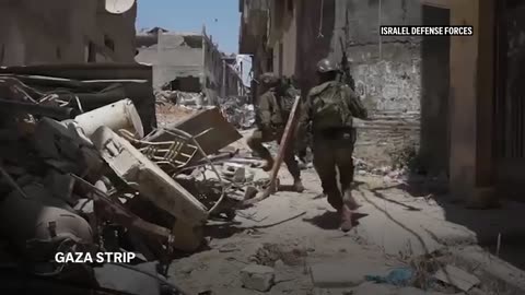 Israeli troops seen in Gaza as forces advance deeper in territory's largest city.mp4