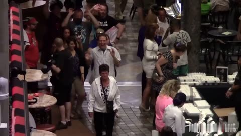 Group Dancing behind people on the cruise