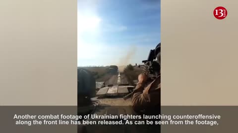 Frontline combat image of Ukrainian soldiers during counter-attack with vehicles and infantry