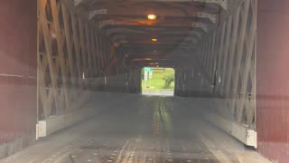 driving through a cover bridge in new england